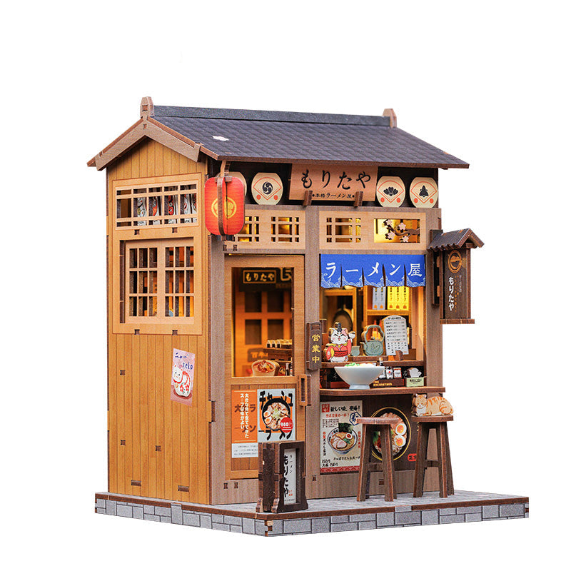Model of a Japanese restaurant with wooden exterior and detailed interior, featuring the brand 'Cute Bee'.